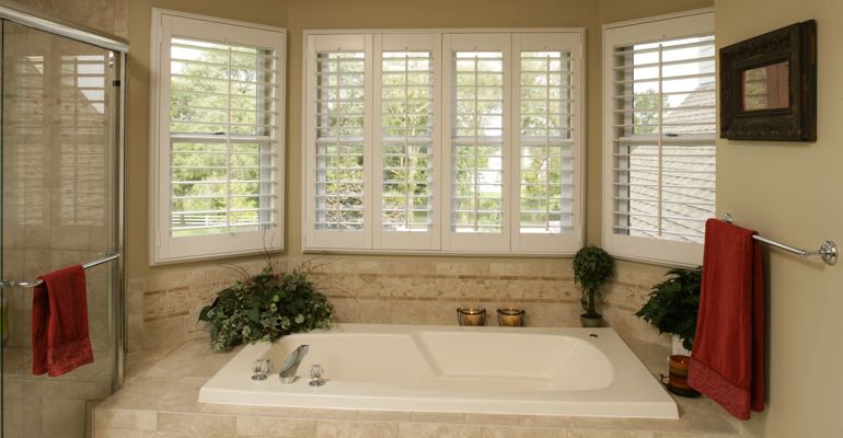 Plantation shutters in Atlanta bathroom.